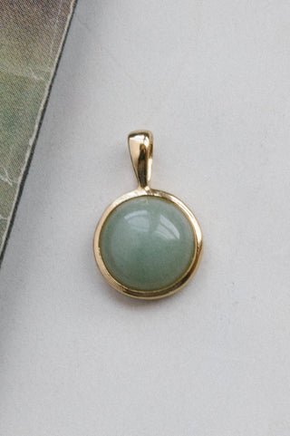 green aventurine gemstone pendant with 14kt gold charm	