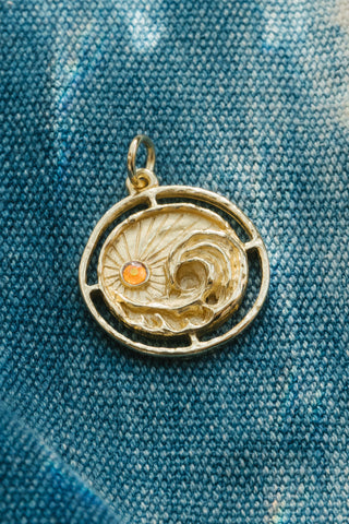 handcrafted sun and wave pendant 14kt gold
