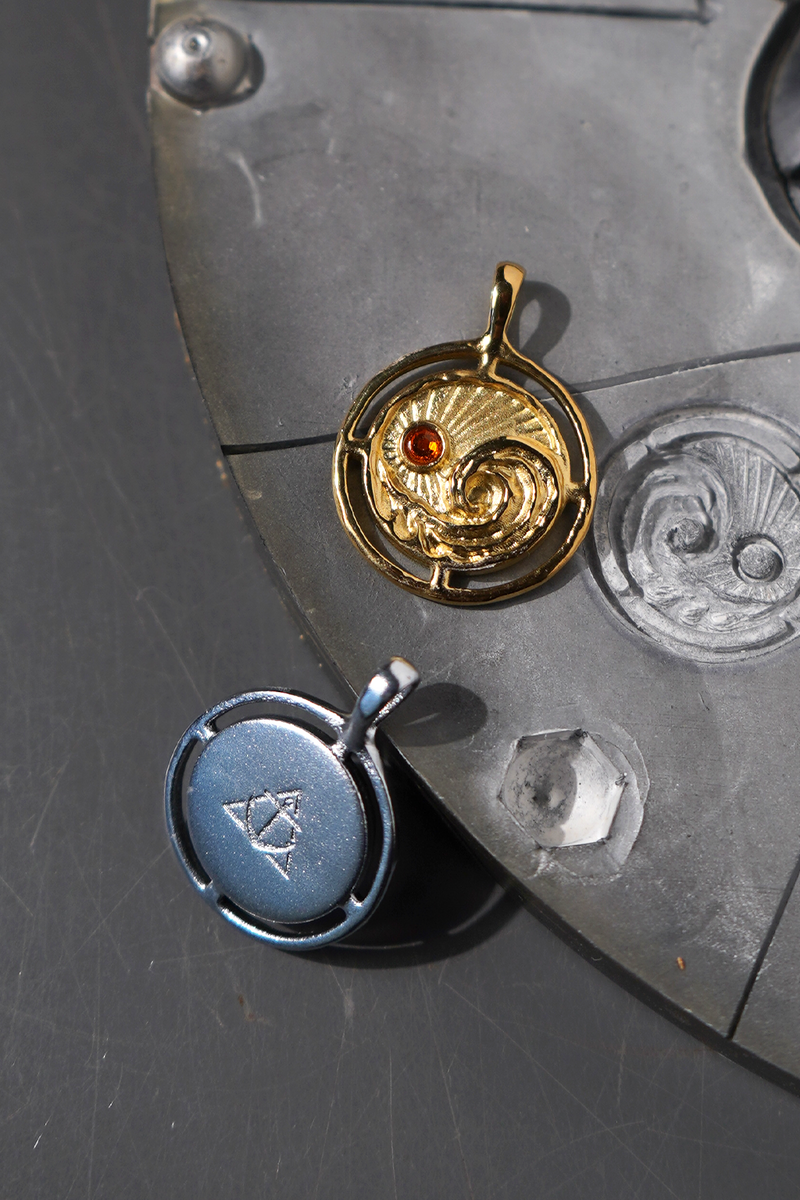 It's A Balancing Act Sun and Wave Pendant