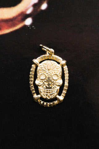 14kt gold skull pendant