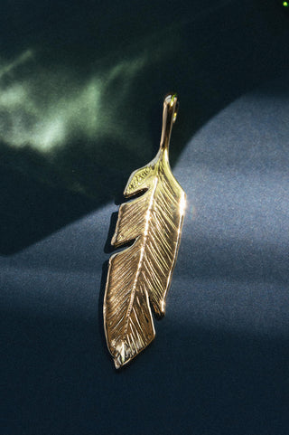 14kt gold oversized feather pendant