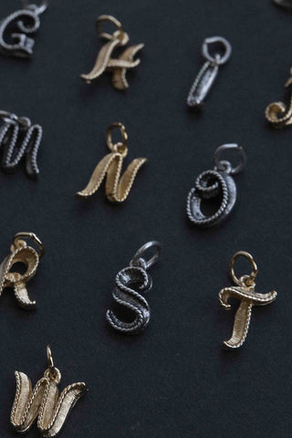 vintage gold and silver initial pendants