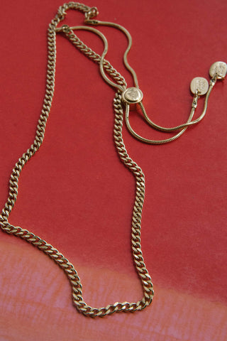 handcrafted polished steel curb chain necklace with gold finish	