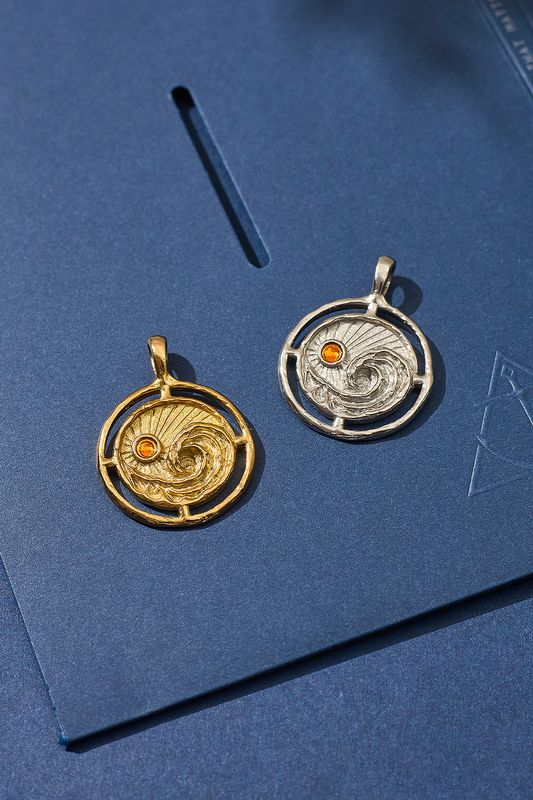 It's A Balancing Act Sun and Wave Pendant