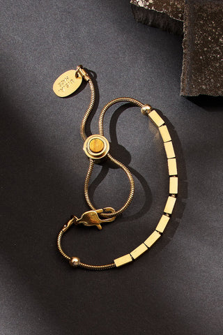 pull some strings adjustable bracelet with tiger’s eye