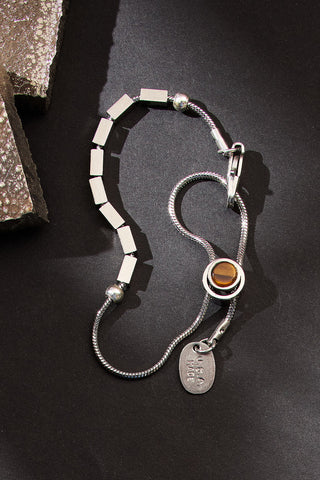 pull some strings adjustable bracelet with tiger’s eye