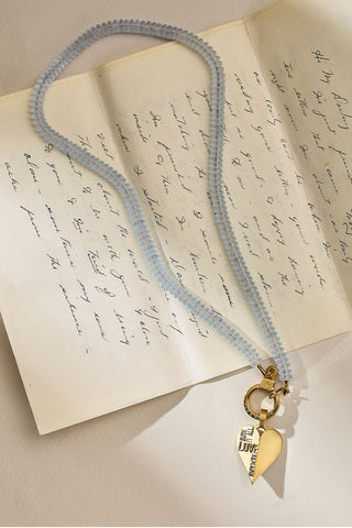 Through the Fire Heart Charm