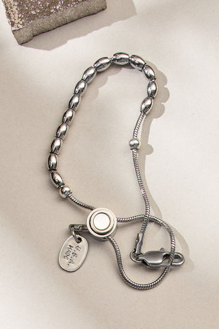 all strung up adjustable bracelet with mother of pearl