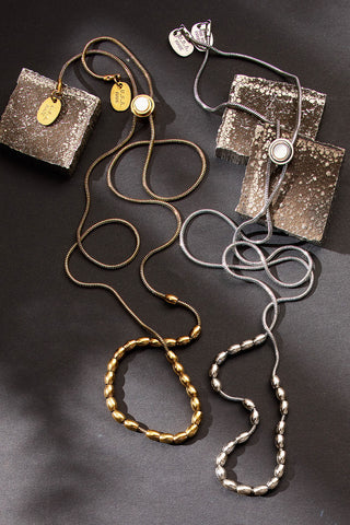 all strung up adjustable necklace with mother of pearl