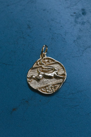 14kt gold leaping hare pendant
